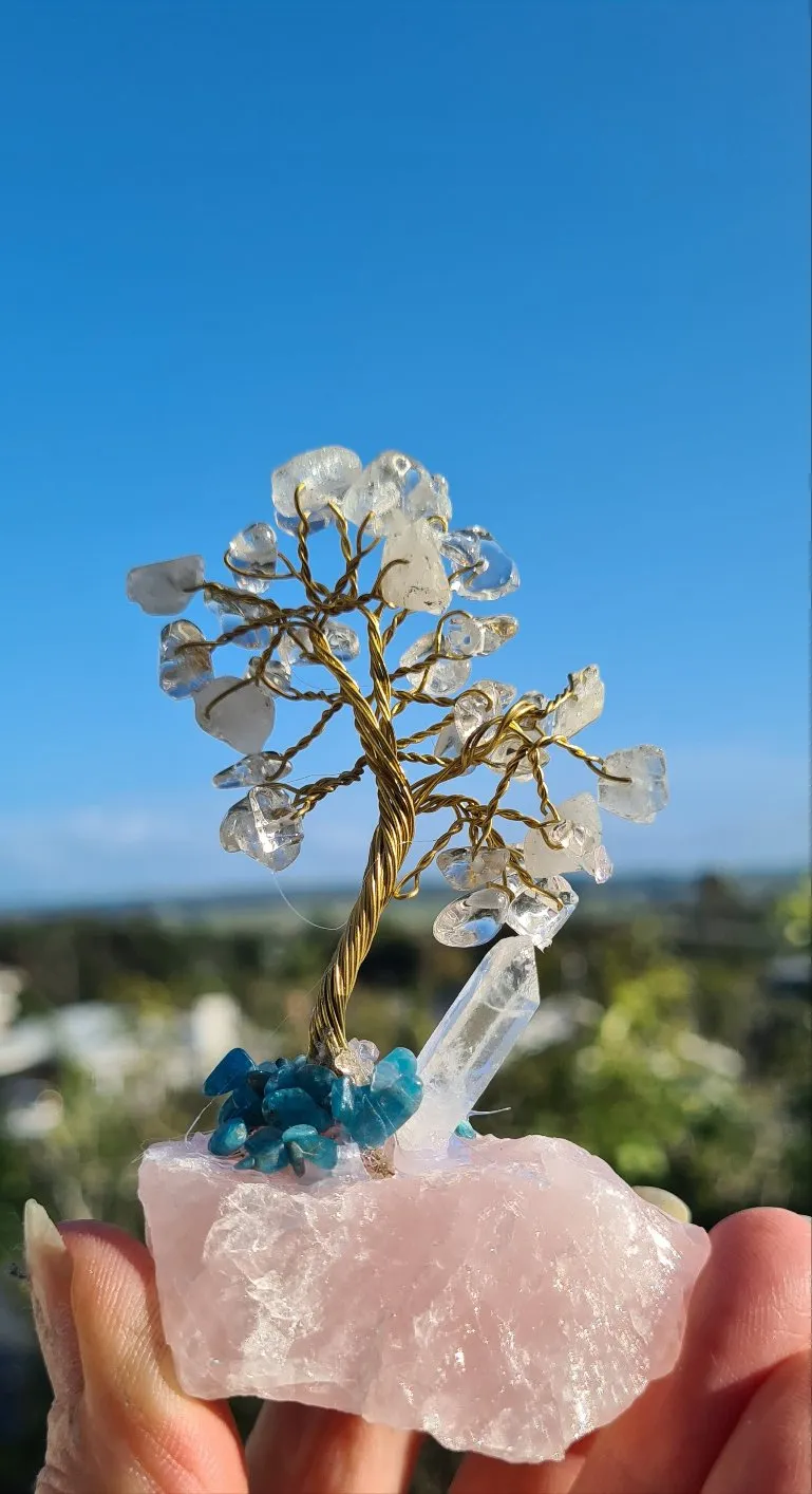 CRYSTAL TREES ON ROSE QUARTZ
